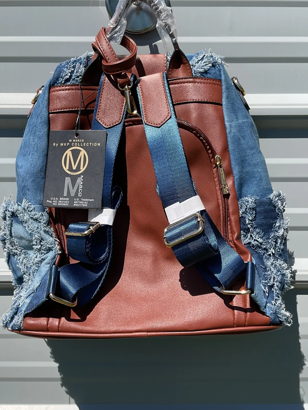 Denim Fringe Quilted Backpack with Brown Trim